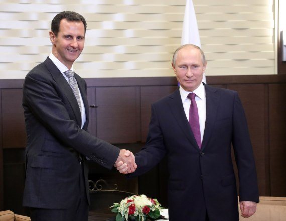 נשיא סוריה בשאר אסד ונשיא רוסיה ולדימיר פוטין